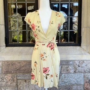 Reformation yellow floral wrap dress